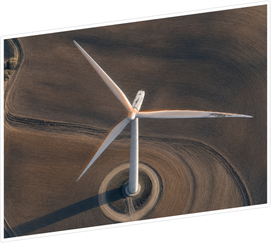 Single wind turbine with an orange dashed pattern overlaid on the blades indicating analysis